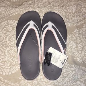 Too big, never worn, adidas flip flops